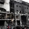 إحراق مباني مجمع الشفاء وخروجه بالكامل عن الخدمة وعشرات الجثث..