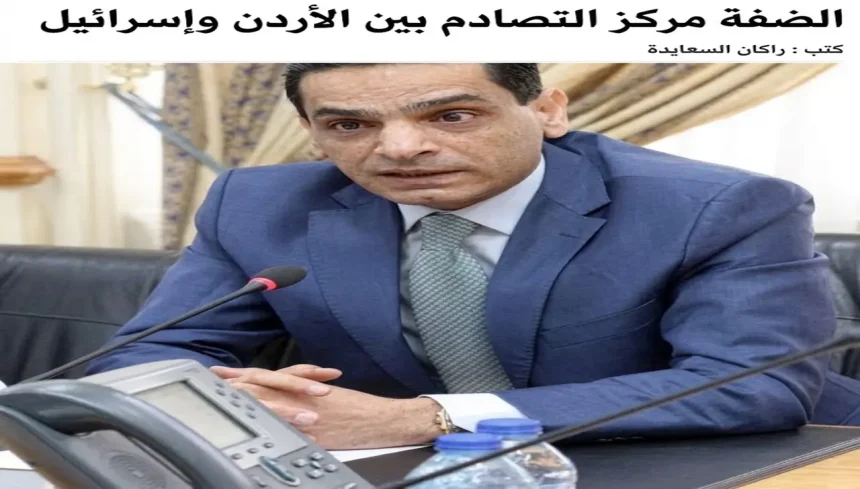 صورة شخصية للكاتب والصحفي الأردني راكان السعايدة يرتدي بدلة رسمية.